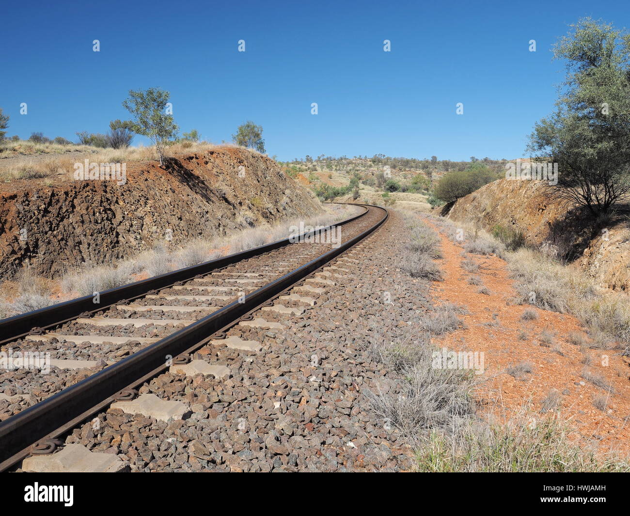 The Ghan railway track from Darwin to Alice Springs, near Alice Springs, Australia  July 2015 Stock Photo