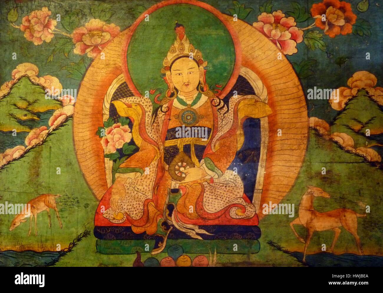 Tibetan Buddhist painting or thangka, an important traditional meditational tool depicting Buddha Stock Photo