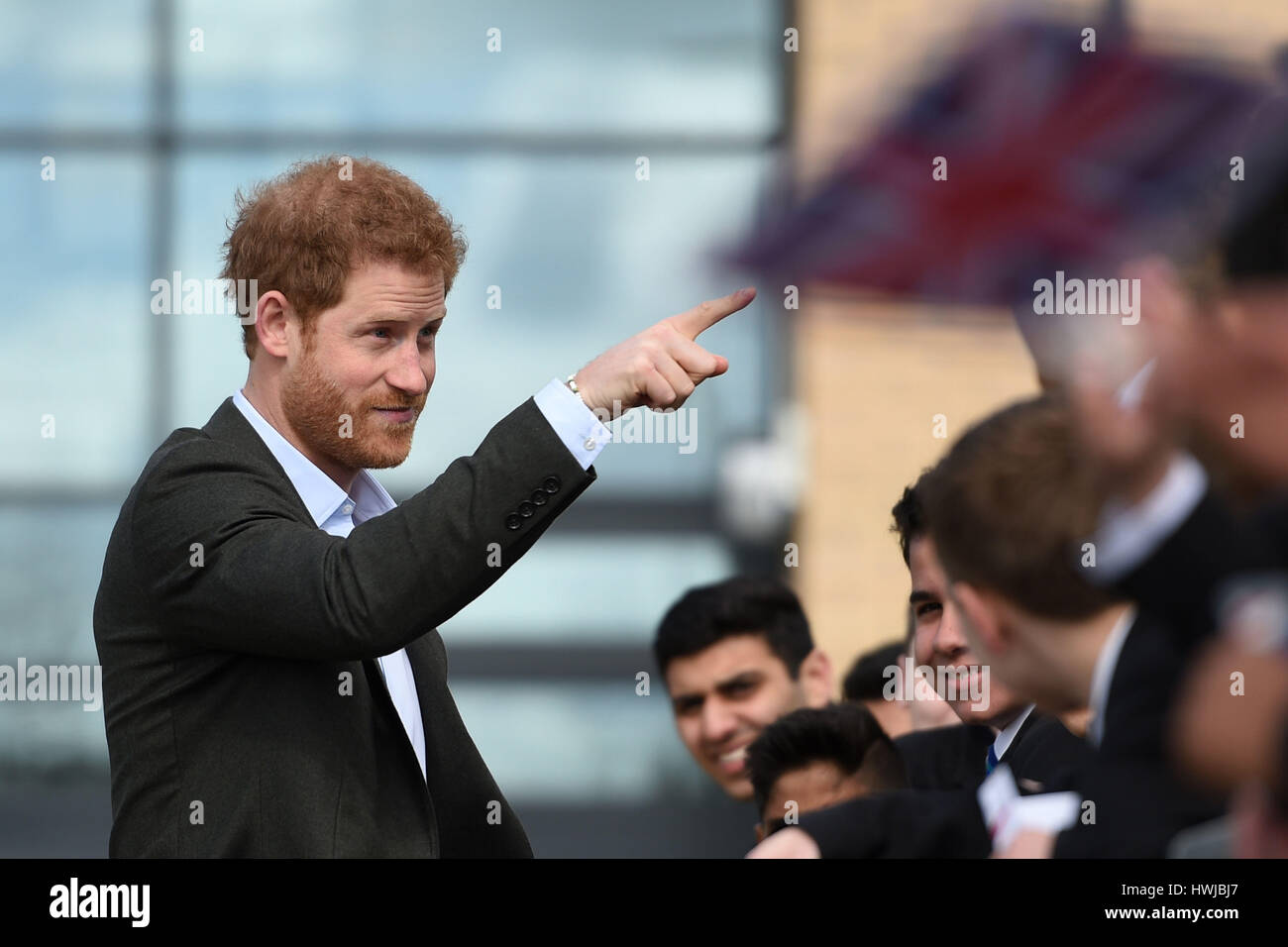 Prince Harry leaves after meeting representatives and pupils of the Yes You Can personal development project, which works to help under-performing Year 8 pupils to reach their full potential, at Hamilton Community College in Leicester. Stock Photo