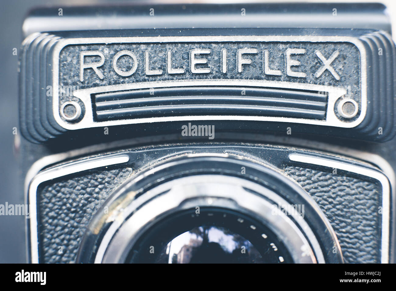 Vintage bioptical Rolleiflex photo camera detail, logo name and body camera part Stock Photo