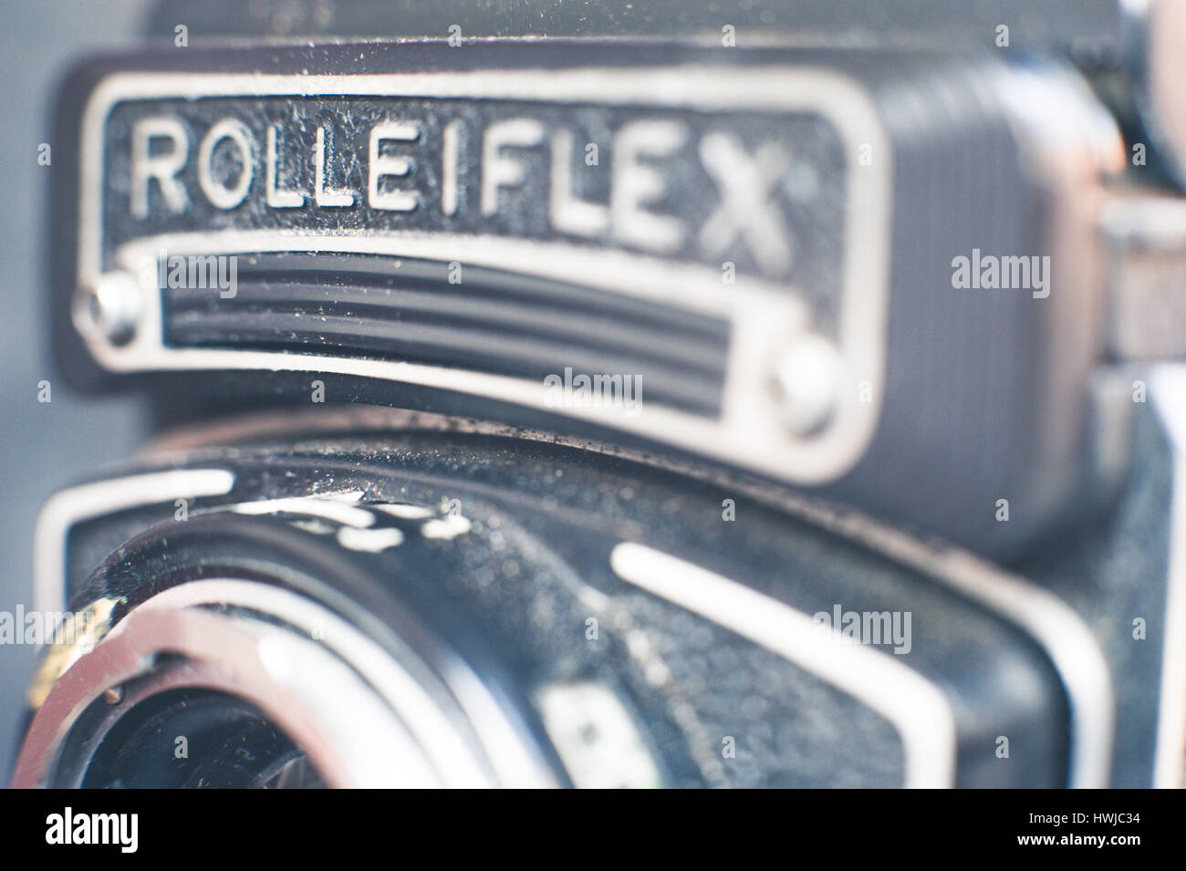 Vintage bioptical Rolleiflex photo camera detail, logo name and body camera part Stock Photo