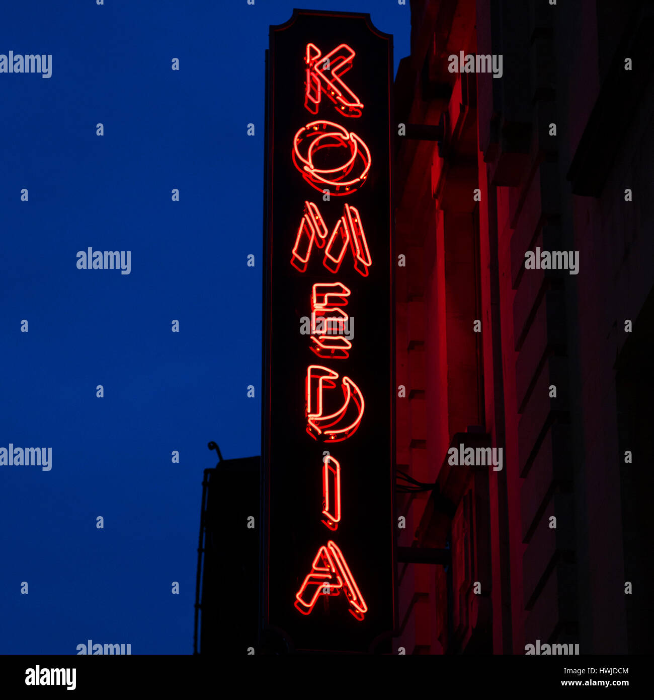Neon sign for the Komedia in Bath, England. The venue stages comedy gigs and stand up shows. Stock Photo