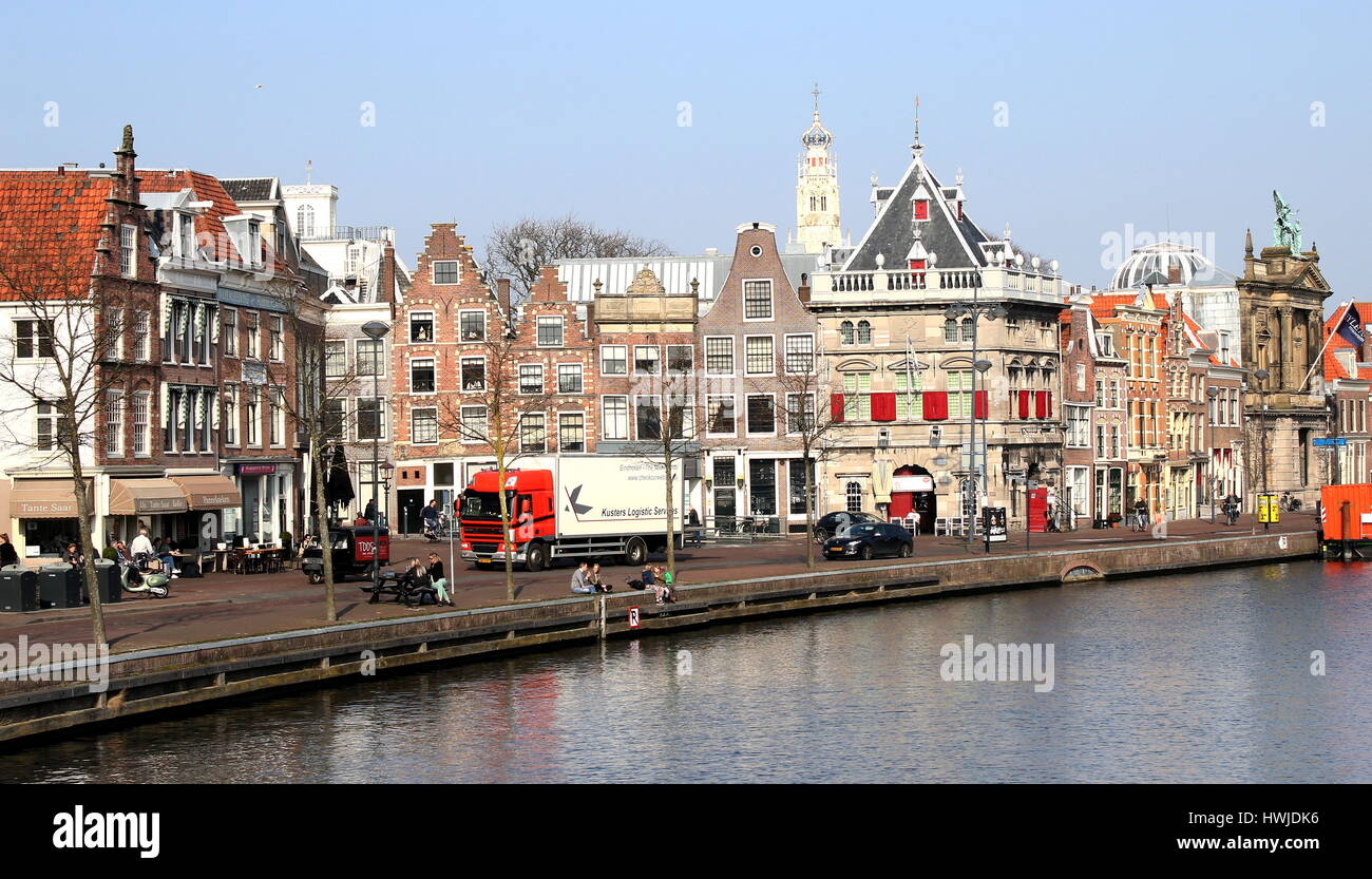 Spaarne river in Haarlem, The Netherlands with De Waag, a former 16th century Weigh house on the right. Stock Photo