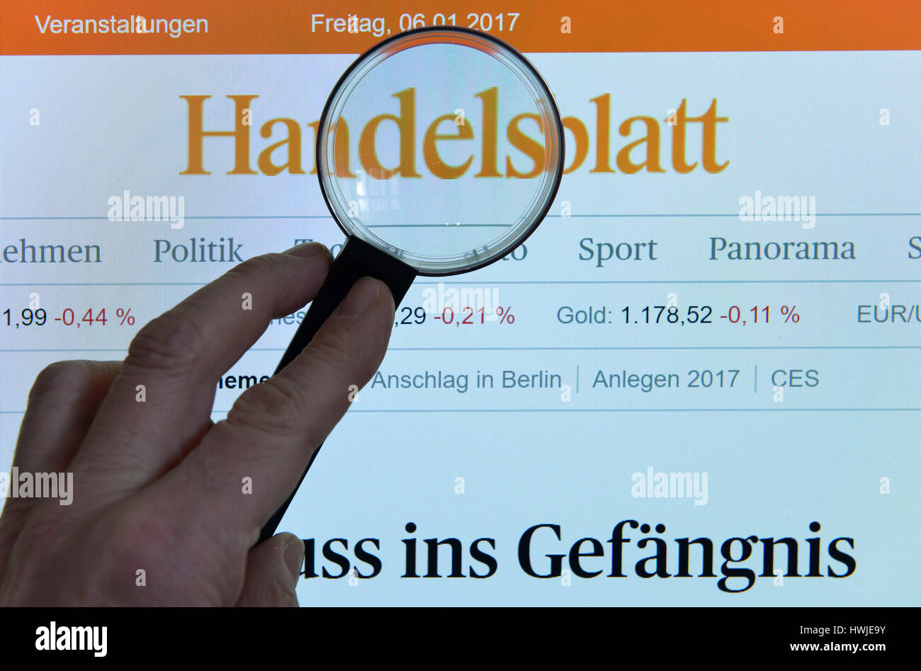 Handelsblatt, Internet, Monitor, Hand, Lupe Stock Photo
