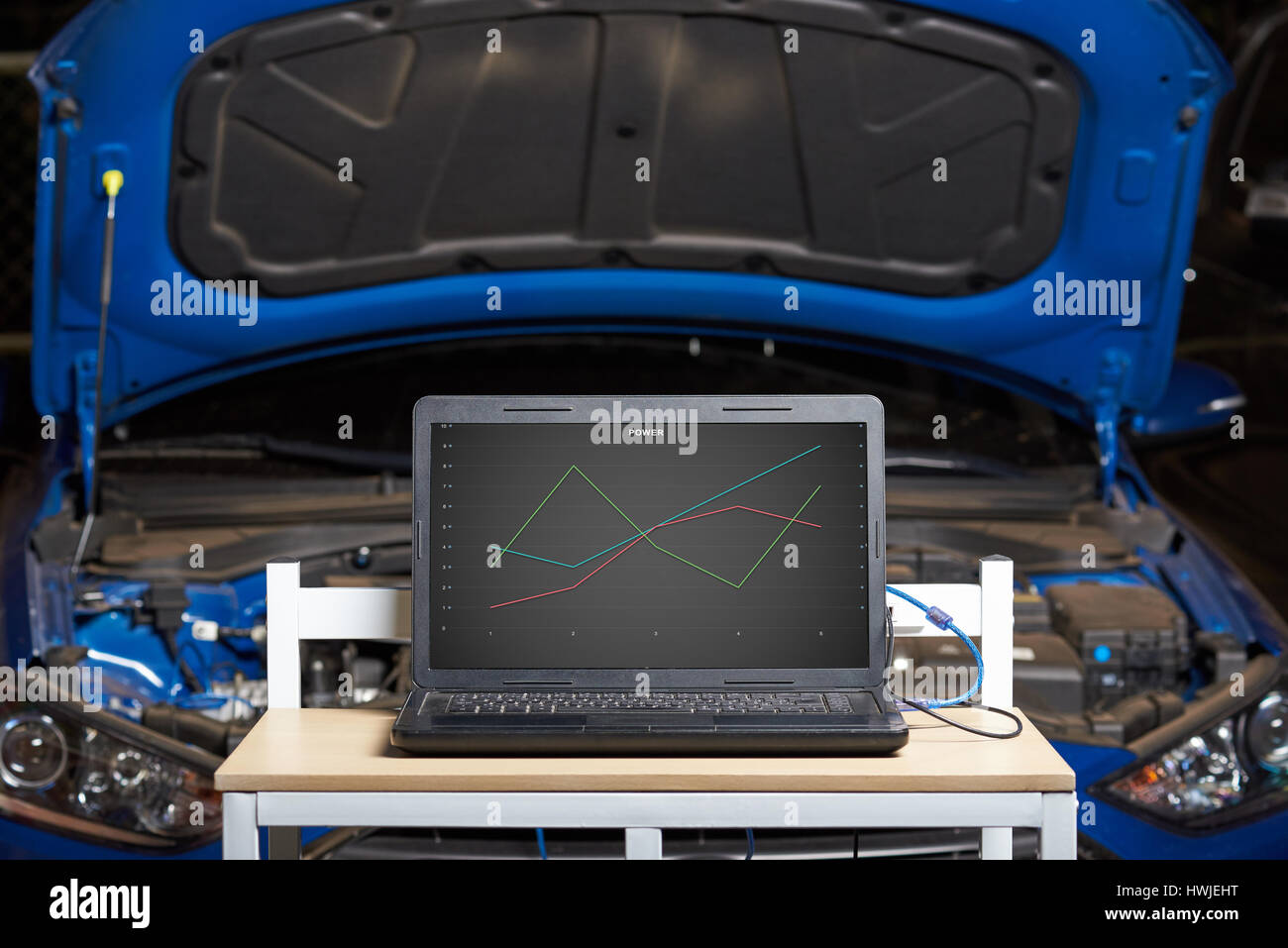 Diagnostic car mockup. Table with laptop for check car engine Stock Photo