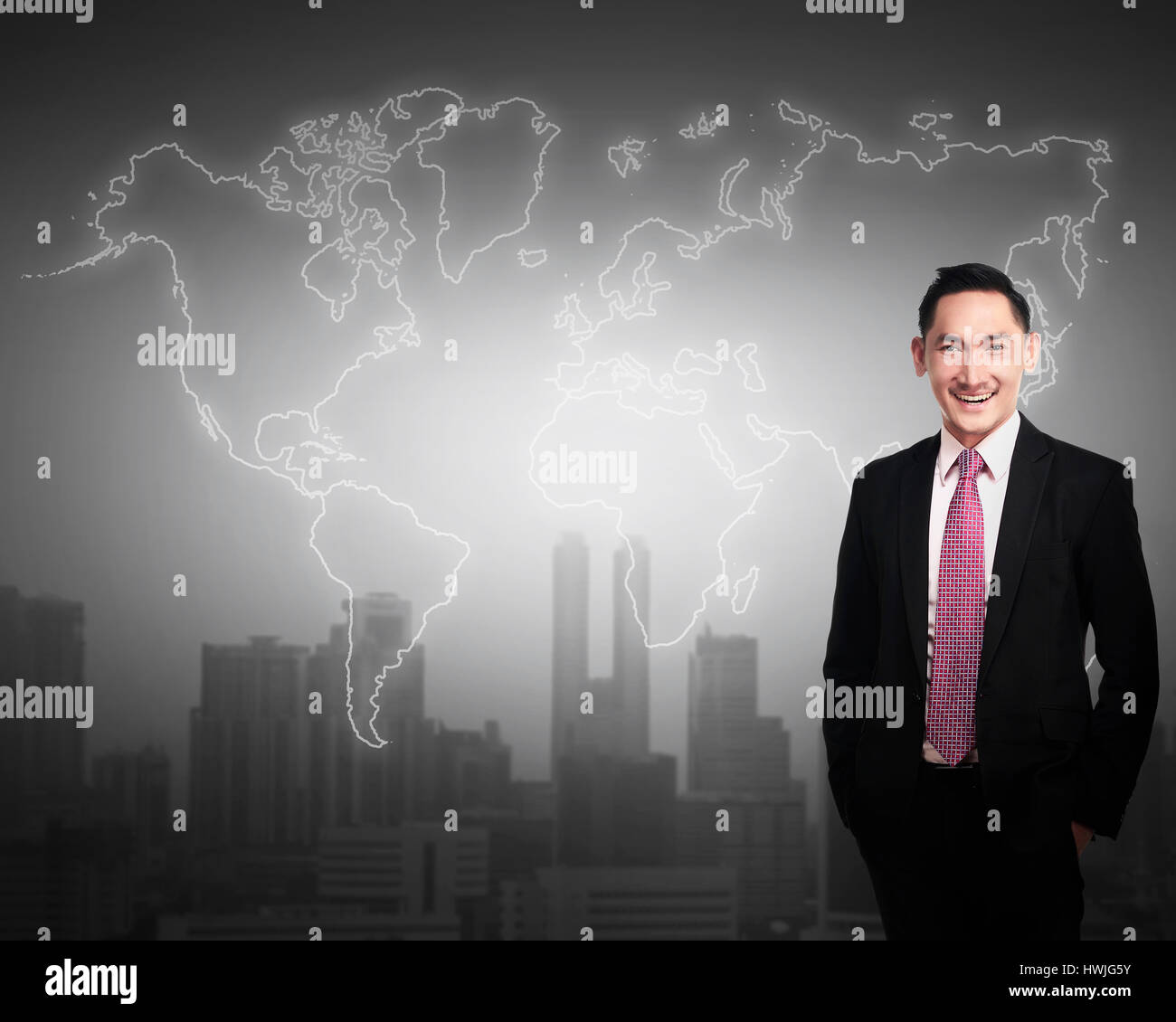 Business man standing in front of world map. Business globalization concept Stock Photo