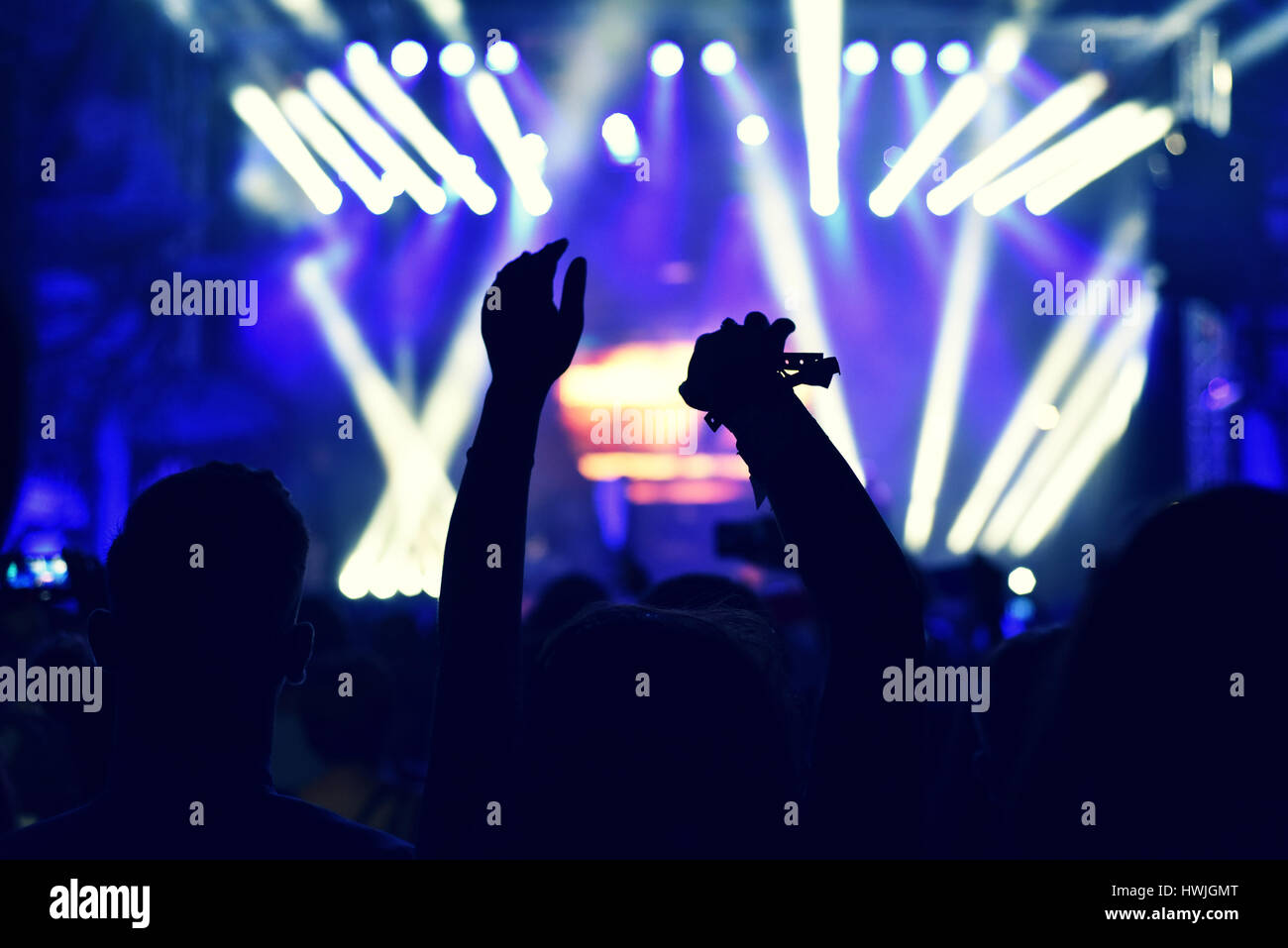 Crowd rocking during concert hi-res stock photography and images - Alamy