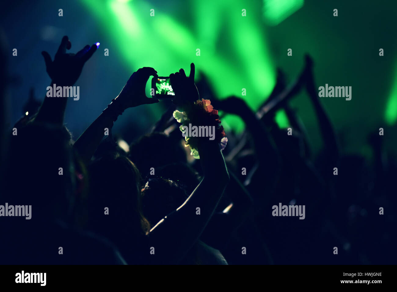Crowd rocking during concert hi-res stock photography and images - Alamy