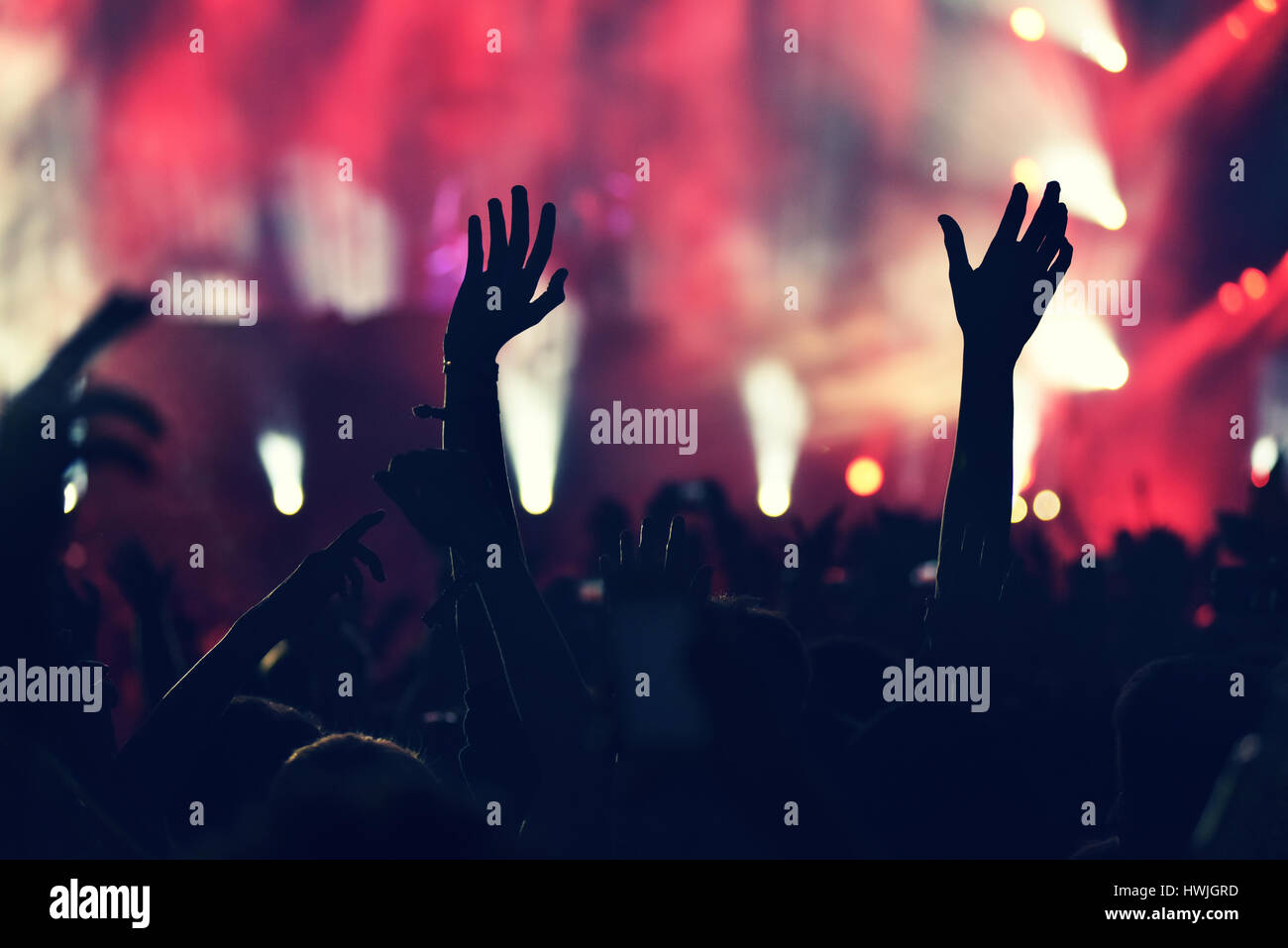 Crowd rocking during concert hi-res stock photography and images - Alamy