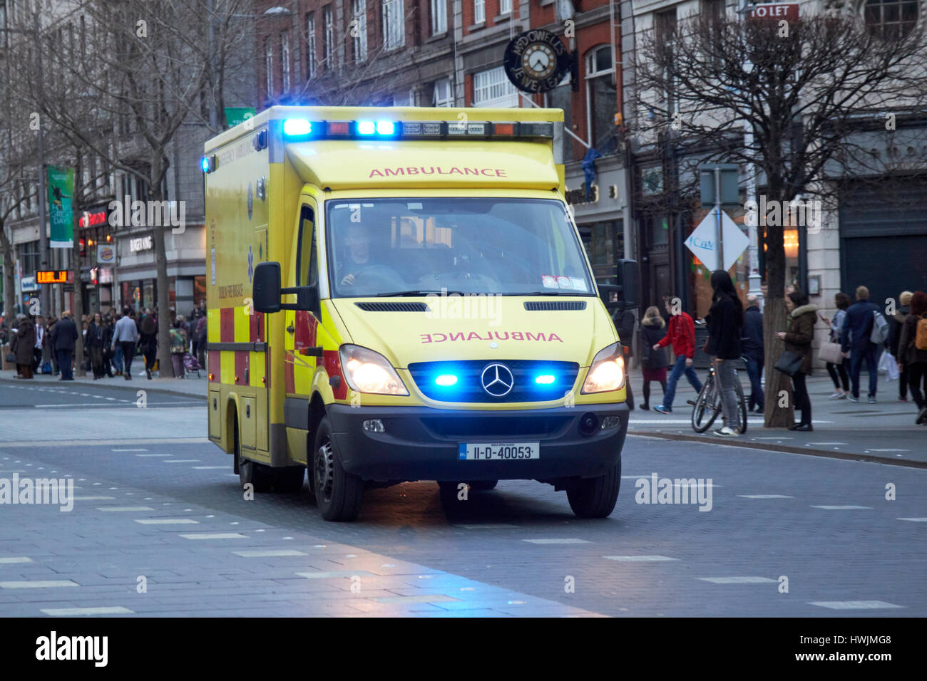 Dublin fire brigade emergency ambulance on oconnell street dublin Republic of Ireland Stock Photo