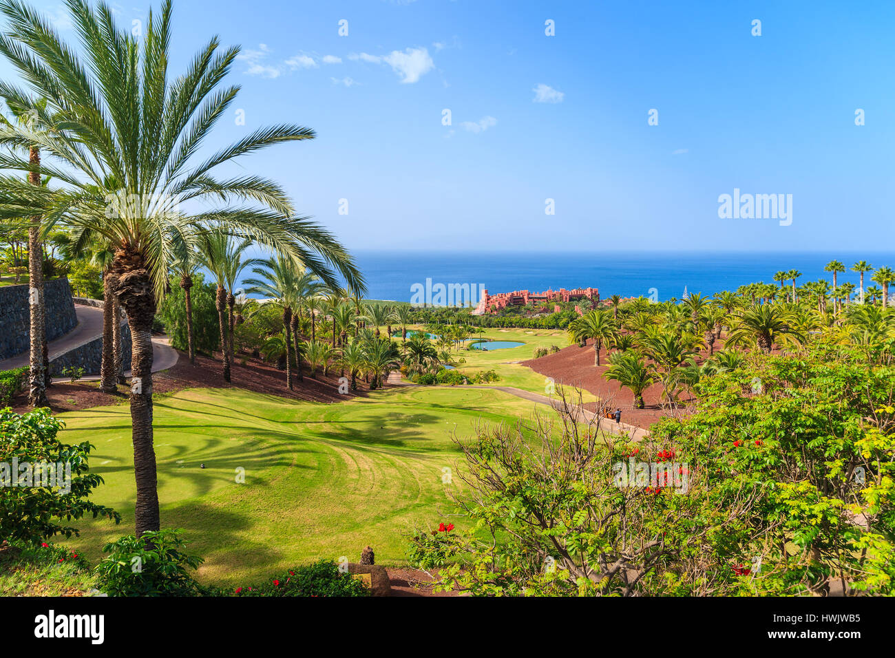 Golf course in tropical landscape of Tenerife island near San Juan town, Spain Stock Photo