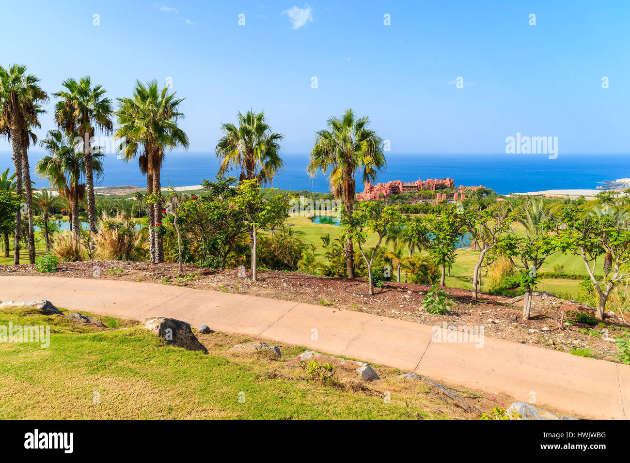 Golf course in tropical landscape of Tenerife island near San Juan town, Spain Stock Photo