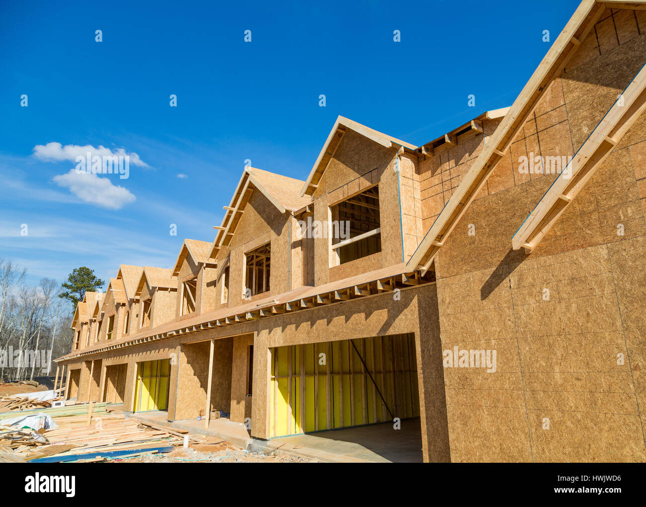 New townhouse construction of pine lumber and sheathing Stock Photo