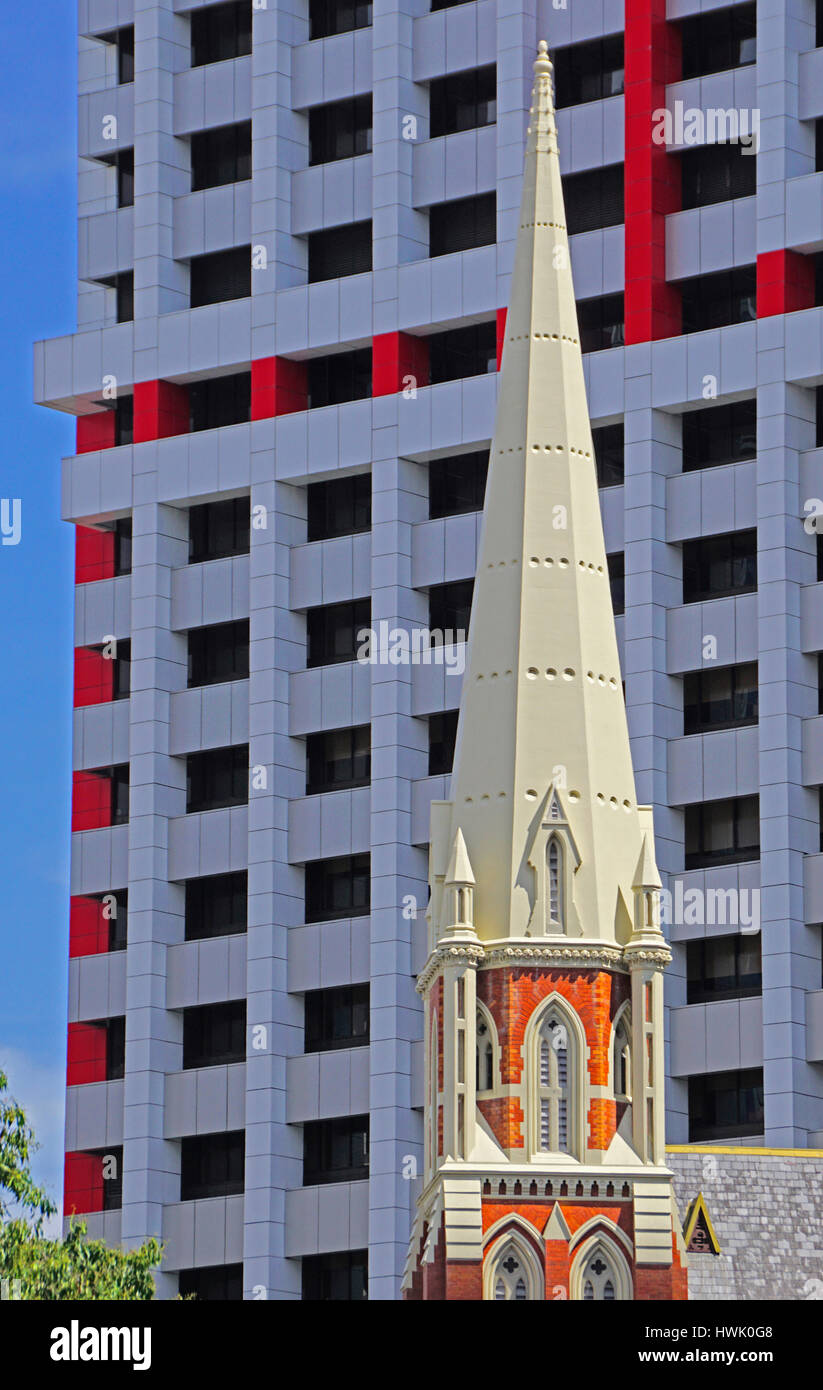 Architecture of Albert Street Congregation Church contrasts with modern Suncorp Building in Brisbane. Stock Photo