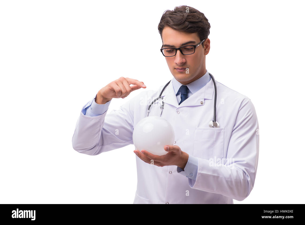 Doctor with crystal ball isolated on white background Stock Photo Alamy