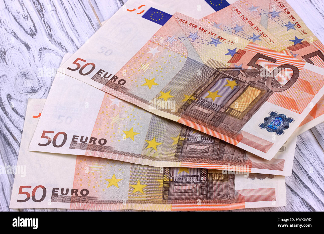 Fifty euro banknotes on white wooden background Stock Photo - Alamy