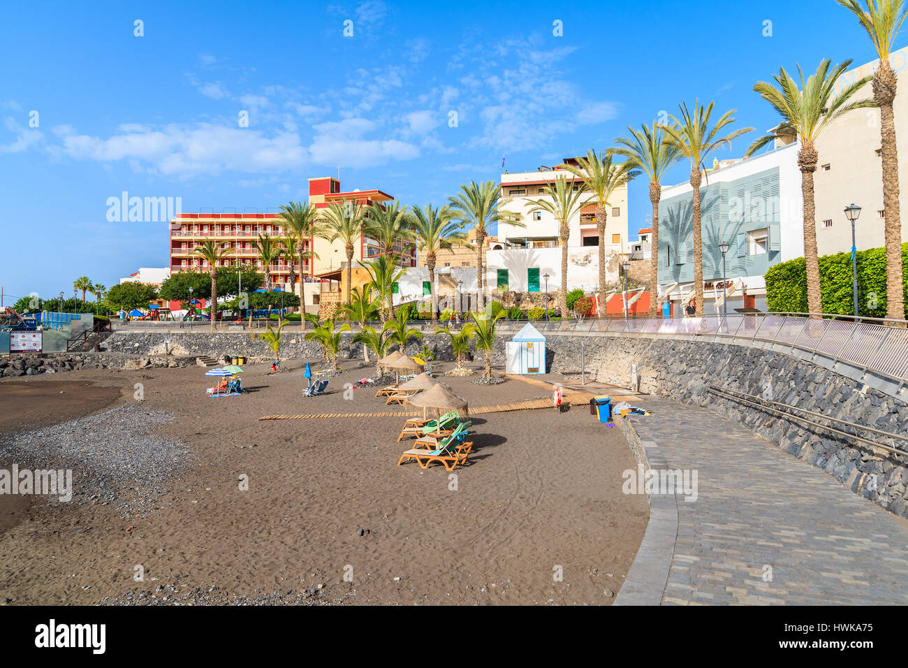 SAN JUAN BEACH, TENERIFE ISLAND - NOV 15, 2015: colorful buildings on a beach in San Juan town on Tenerife island, Spain. Stock Photo
