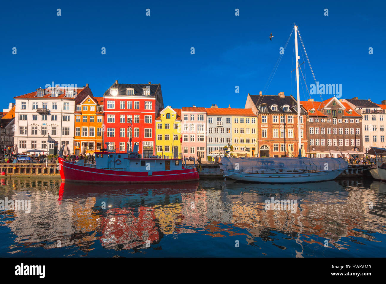 COPENHAGEN, DENMARK - MARCH 11, 2017: Copenhagen Nyhavn canal and promenade with its colorful facades, 17th century waterfront Stock Photo