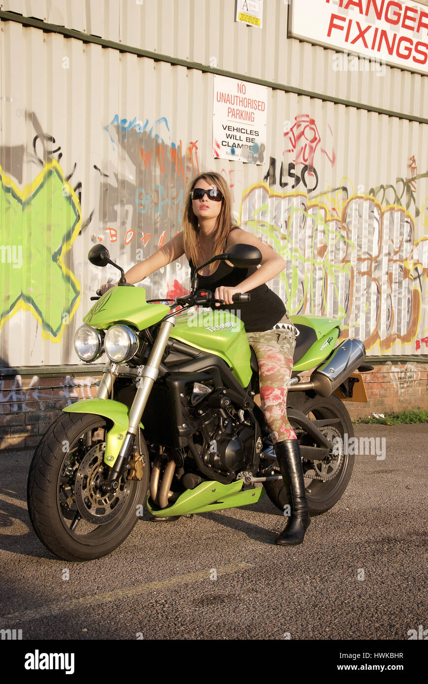 Girl in mini skirt on motorcycle sale
