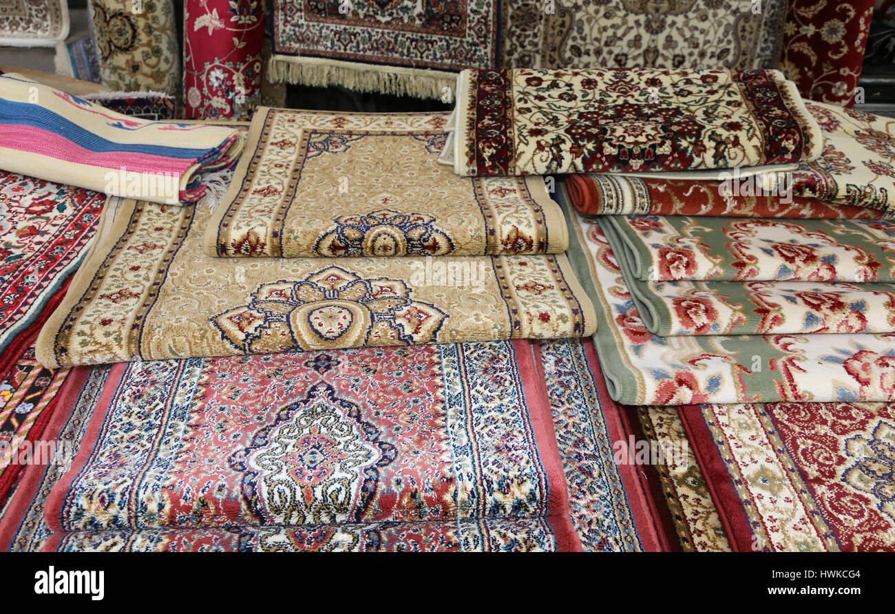 many carpets for sale in the ethnic market stall Stock Photo Alamy