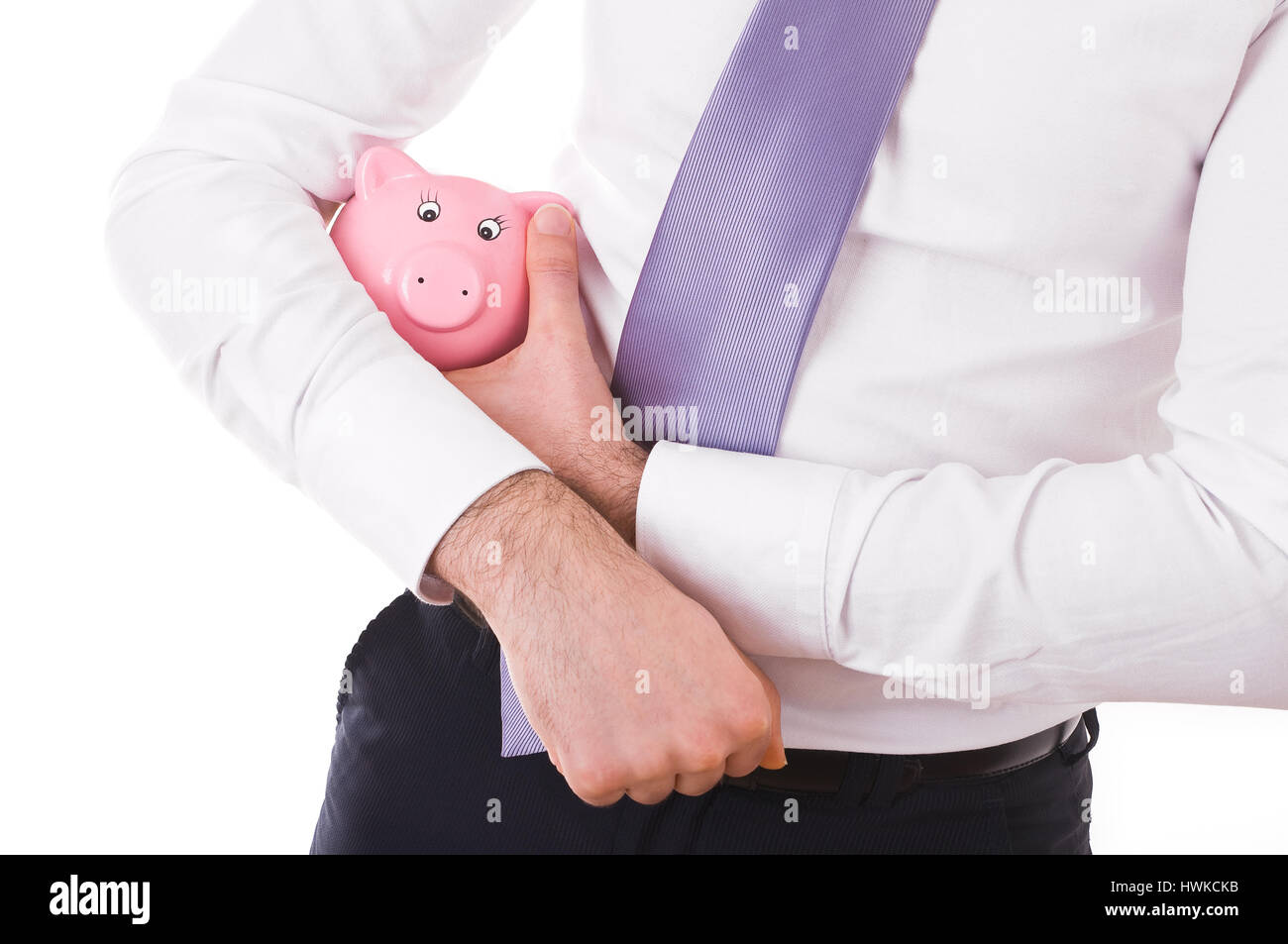 Businessman holding a piggy bank Stock Photo - Alamy