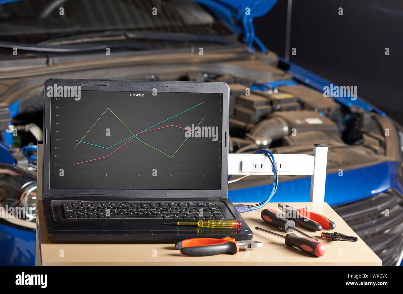 Station for computer checking car. Diagnostic of modern car Stock Photo