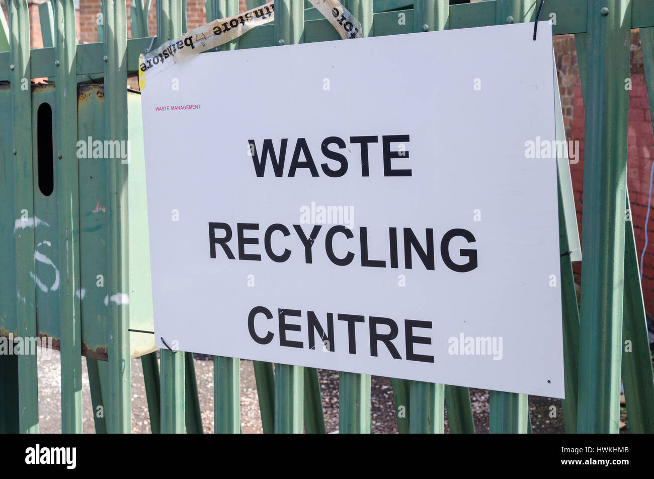 Home made sign for Waste Recycling Centre tied to iron railings Stock Photo