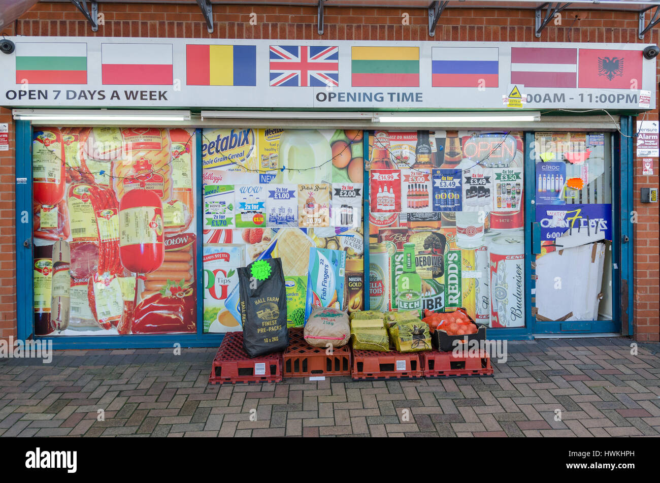 Polish shop with colourful window stickers in Tipton, Black Country, West Midlands Stock Photo