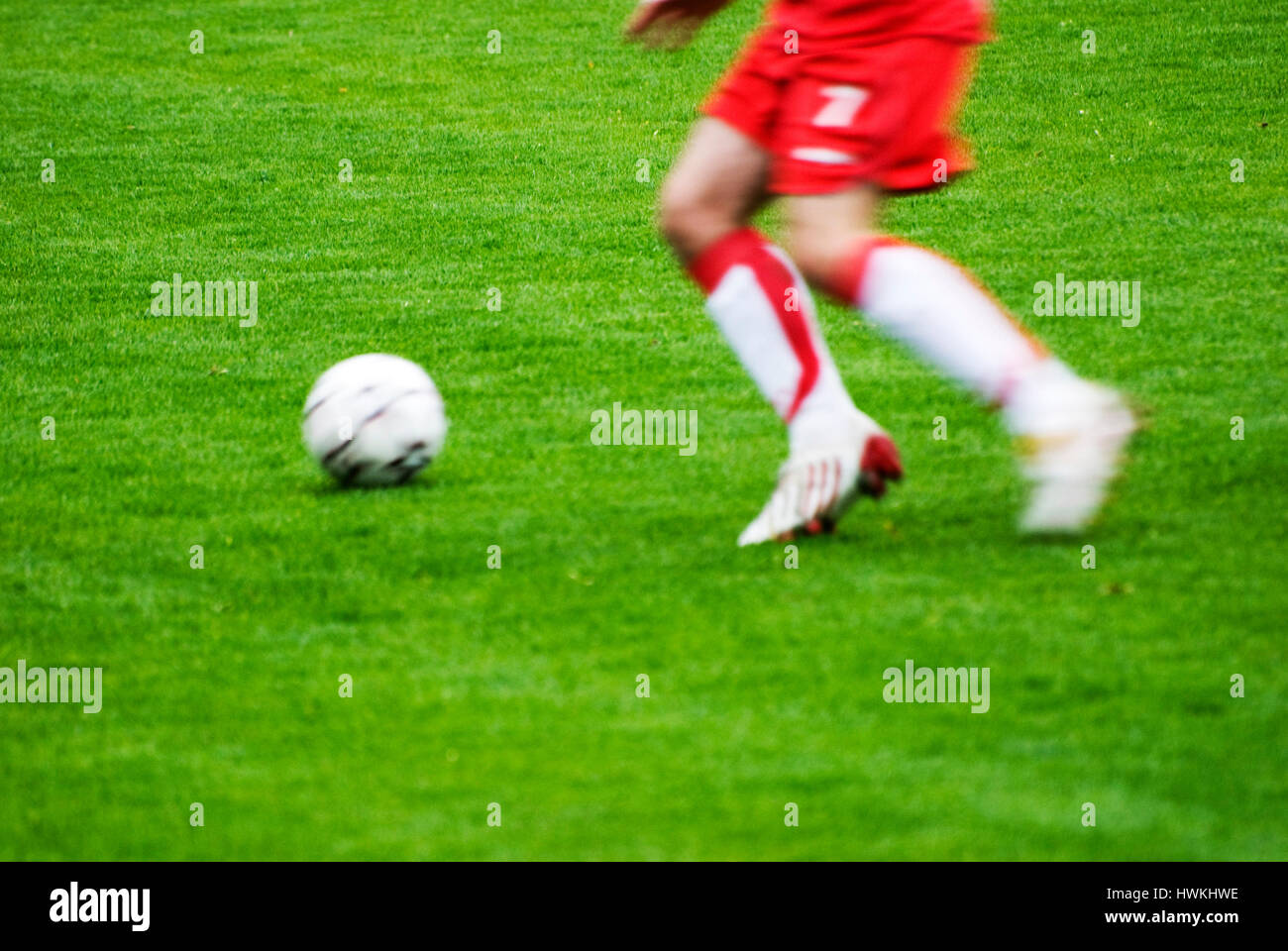 Football Or Soccer Shot With A Neutral Design Ball Being Kicked, With  Motion Blur On The Foot And Natural Background Stock Photo, Picture and  Royalty Free Image. Image 27280599.