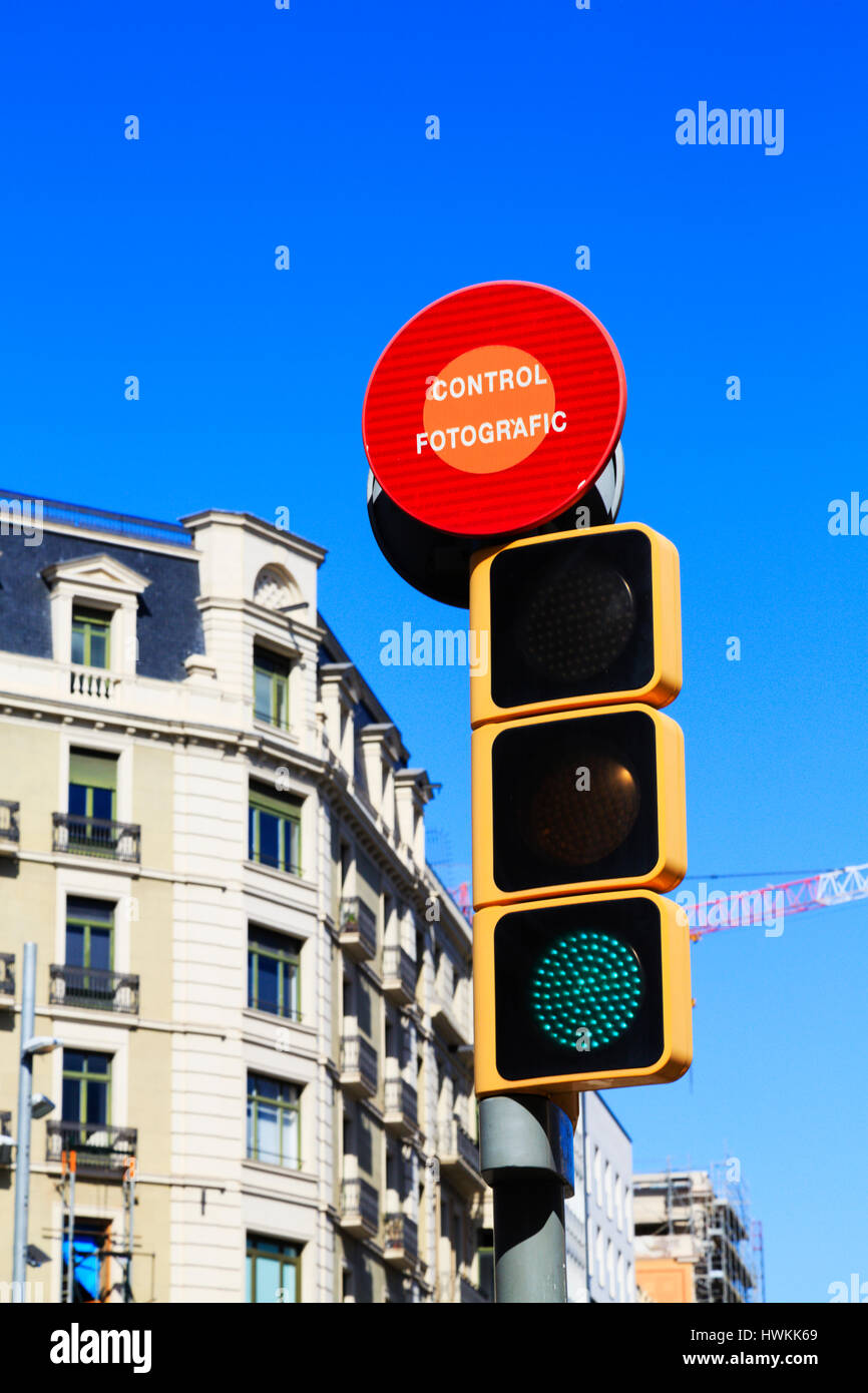 Red light control camera warning sign on traffic lights, Barcelona, Catalunya, spain Stock Photo