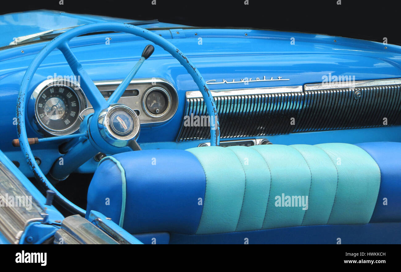 Classic car interior dashboard.  American vintage car. Chevrolet Facia. Havana, Cuba. Full frame. Blues. Abstract. Stock Photo