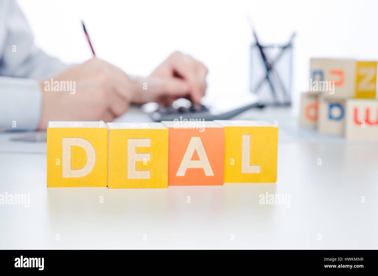 DEAL word with colorful blocks. deal word block business work calculator hand blocks concept Stock Photo