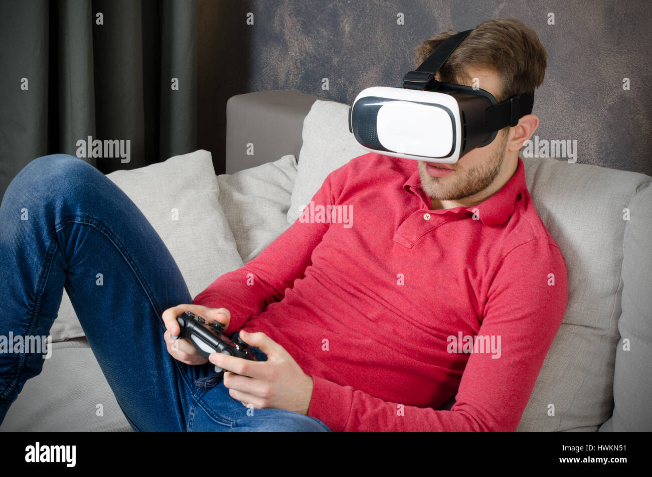 Man wears virtual reality glasses with smartphone inside. vr glasses