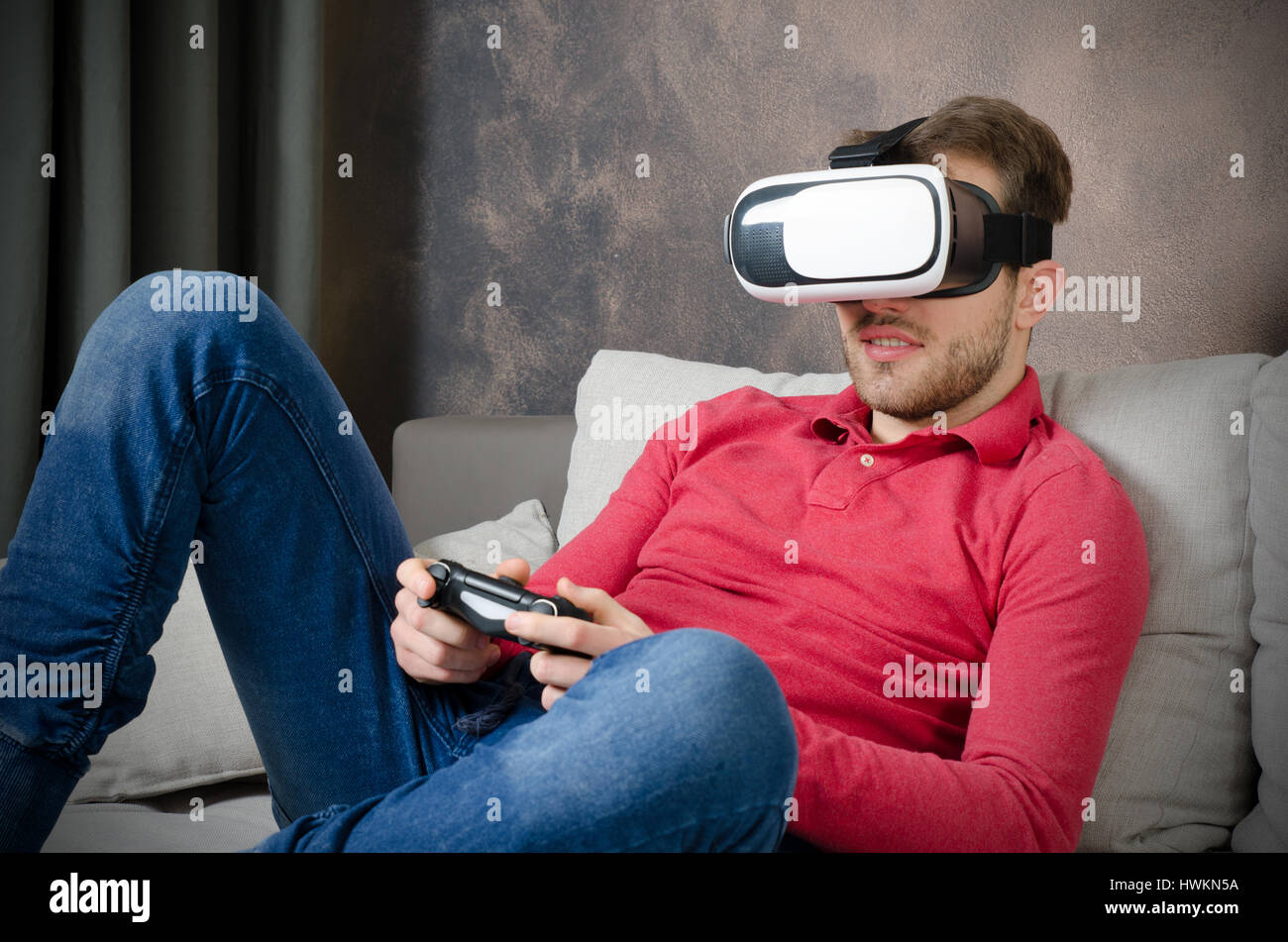 Man wears virtual reality glasses with smartphone inside. vr glasses virtual reality glass 3d cyberspace simulation concept Stock Photo