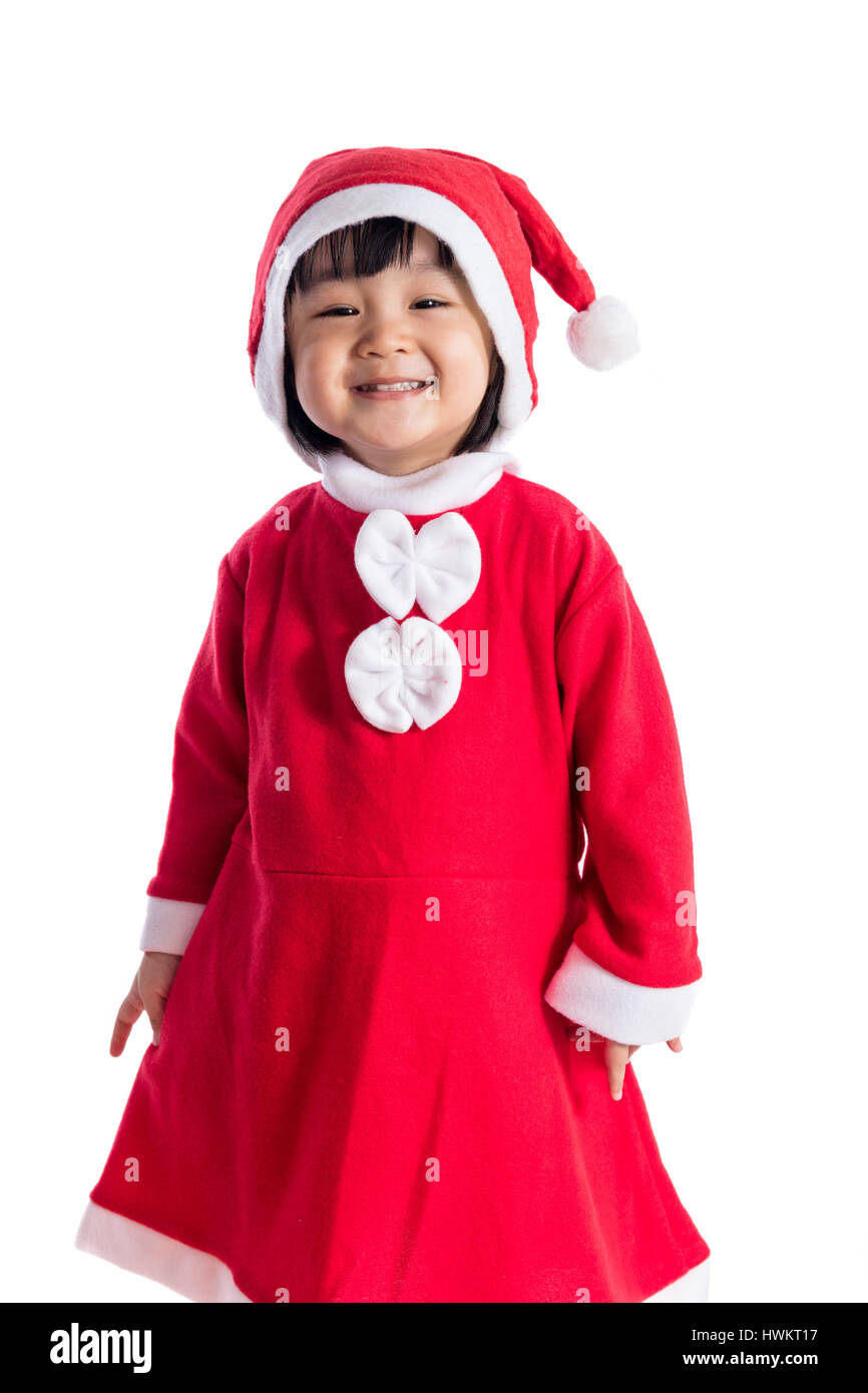 Happy Asian Chinese little girl wearing santa claus costume in isolated ...