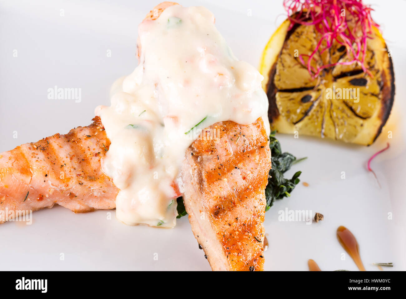 grilled salmon steak with sauce Stock Photo - Alamy