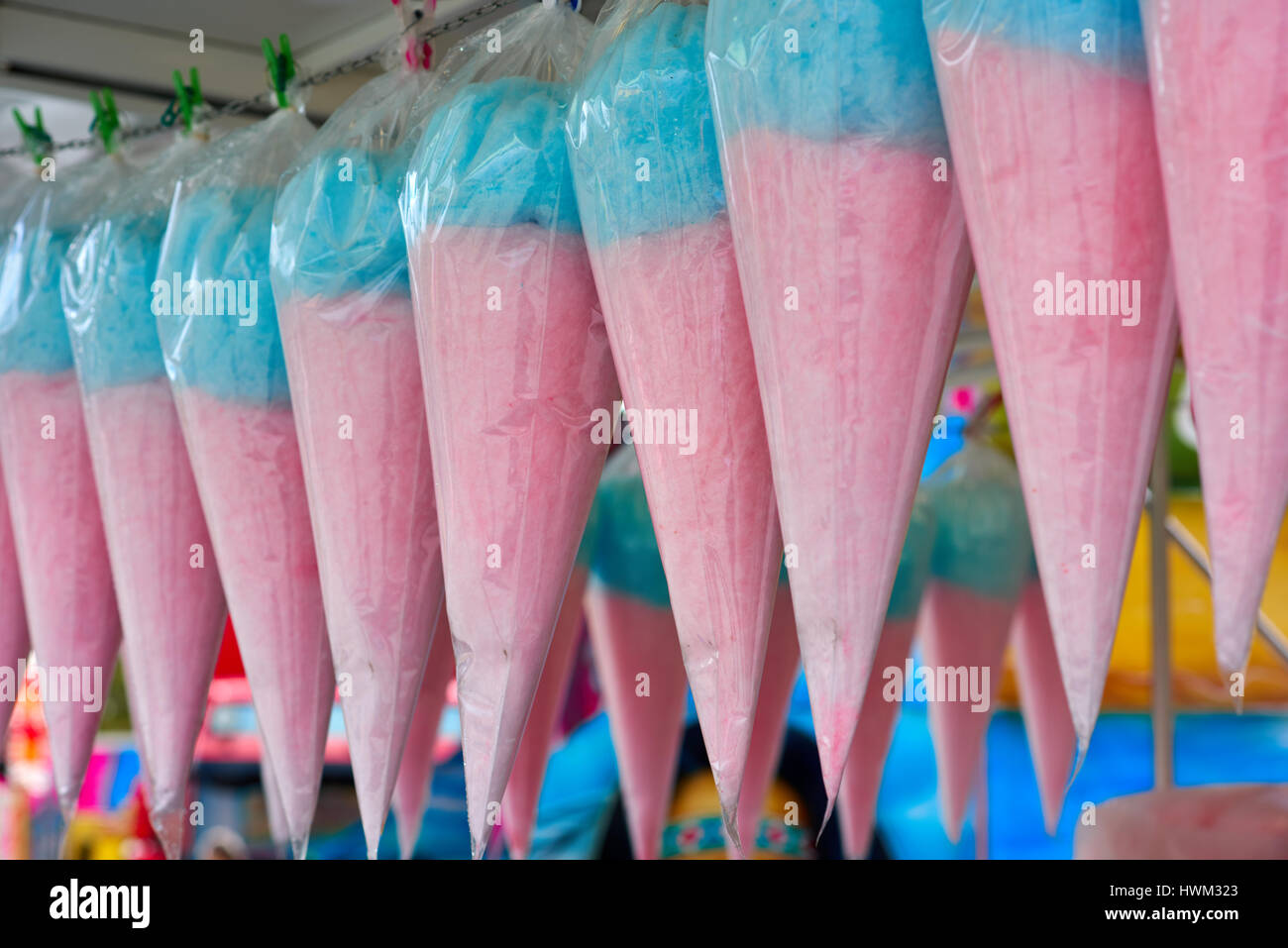 Candy floss, pink and blue found in an amusement park. Stock Photo