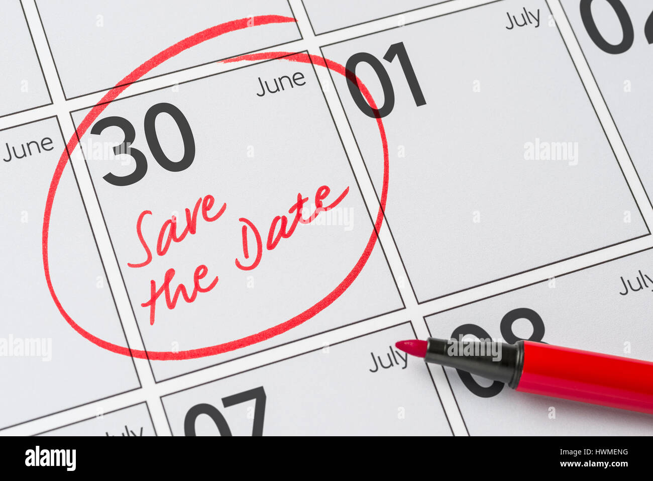 Save the Date written on a calendar June 30 Stock Photo Alamy