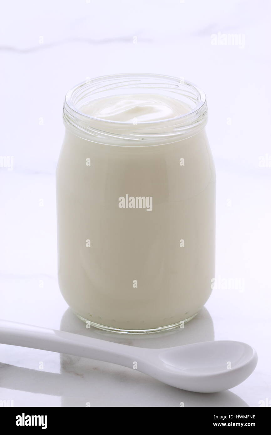 Delicious, nutritious and healthy fresh plain yogurt on vintage italian