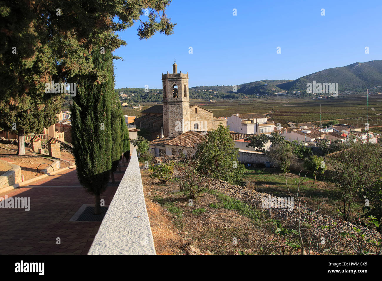 Church tower and village rooftops, Lliber, Marina Alta, Alicante province, Spain Stock Photo