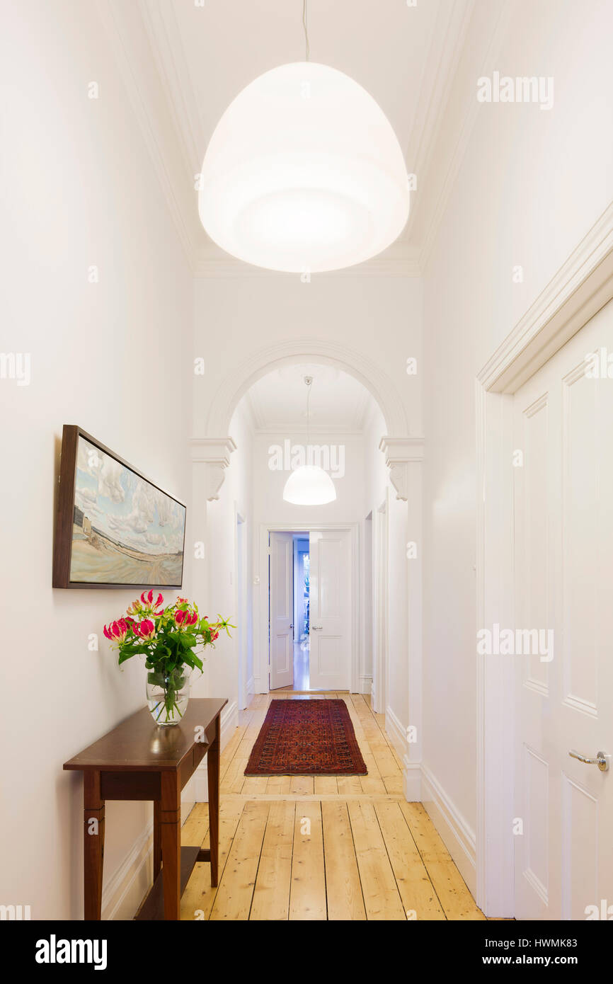 View from front door down hallway. Hawthorne House, Melbourne, Australia. Architect: Annie Lai Architects, 2013. Stock Photo