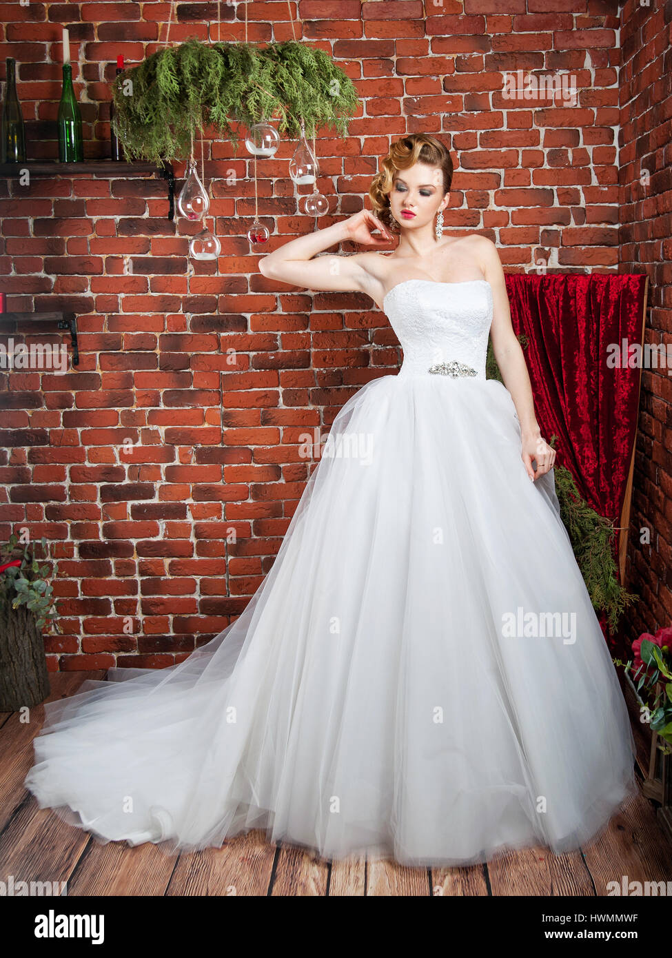 portrait of blonde bride in interior Stock Photo - Alamy