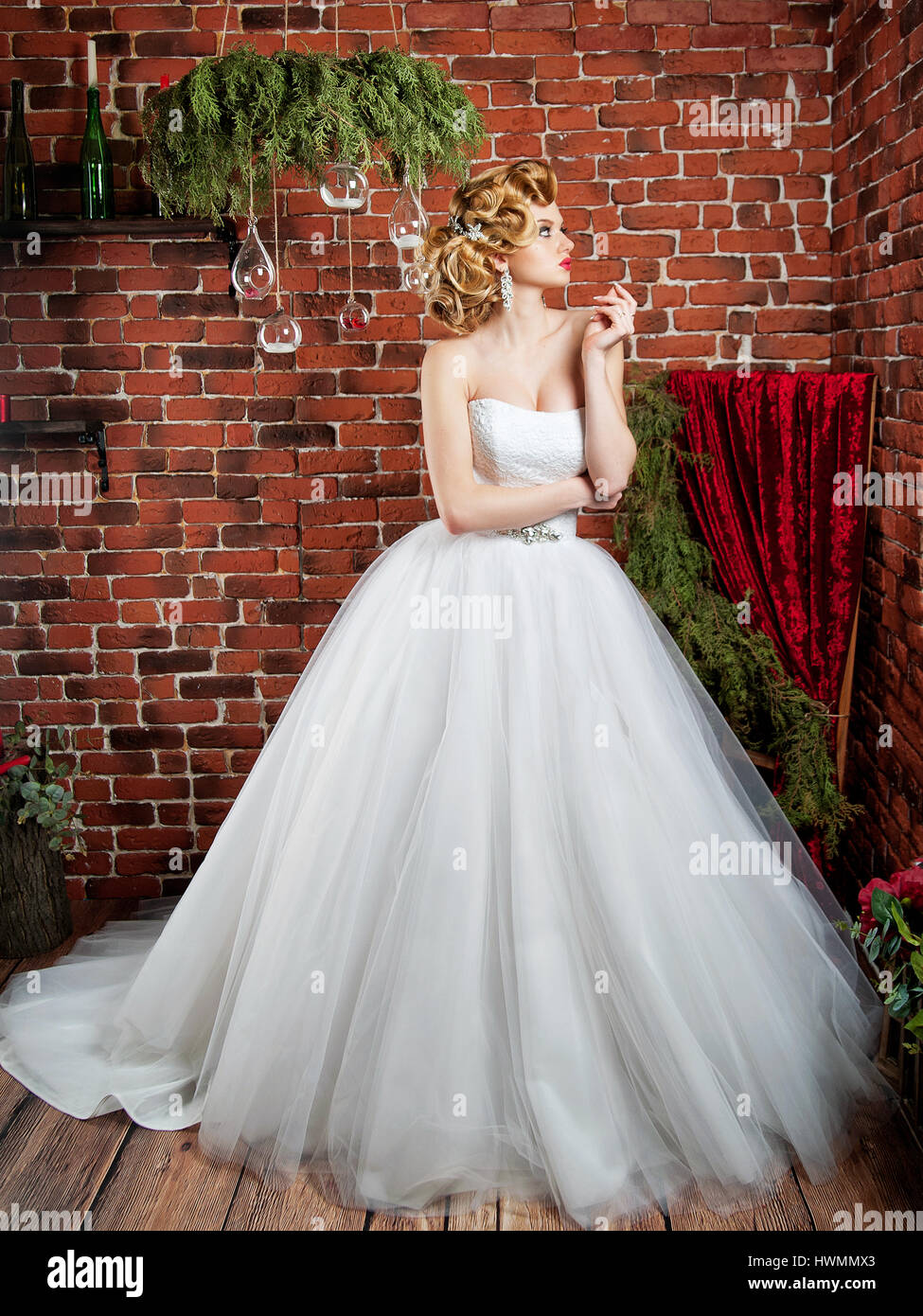 portrait of blonde bride in interior Stock Photo - Alamy