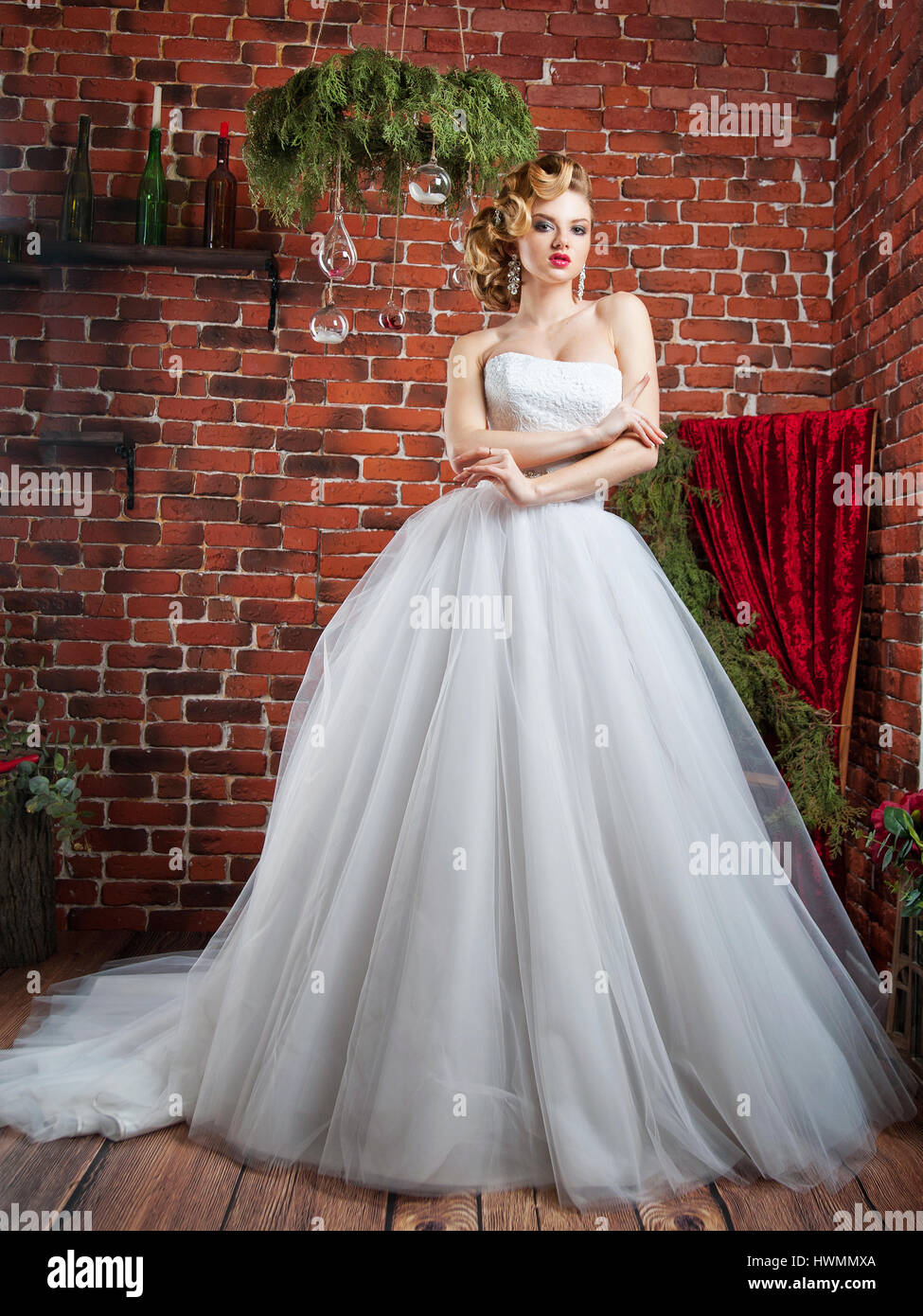 portrait of blonde bride in interior Stock Photo - Alamy
