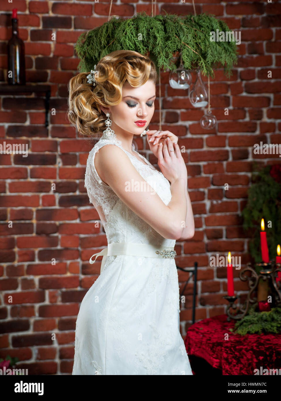 portrait of blonde bride in interior Stock Photo - Alamy