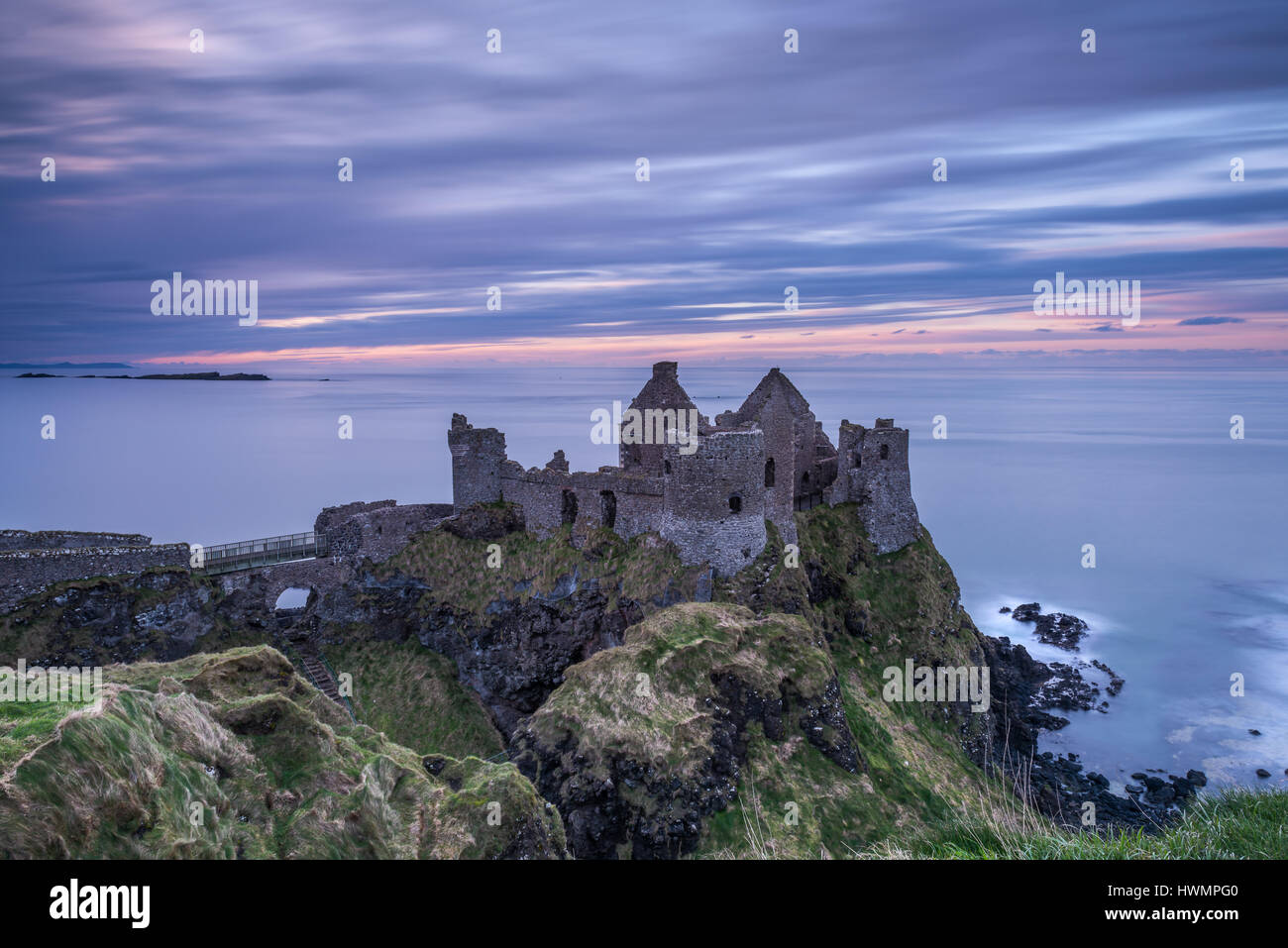 Sunset at Dunluce Castle on the north coast of Ireland Stock Photo