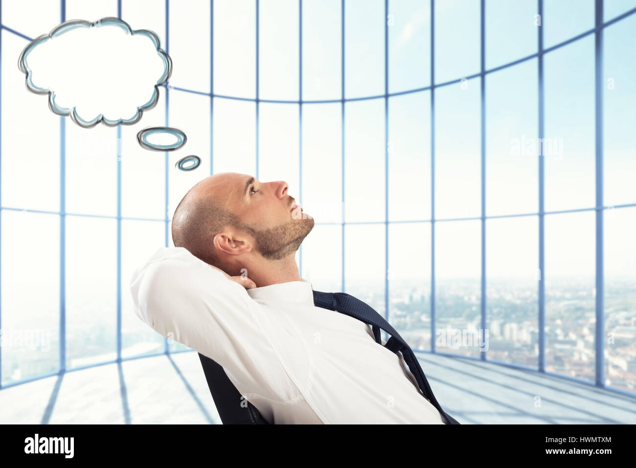 Successful Businessman relax and think Stock Photo