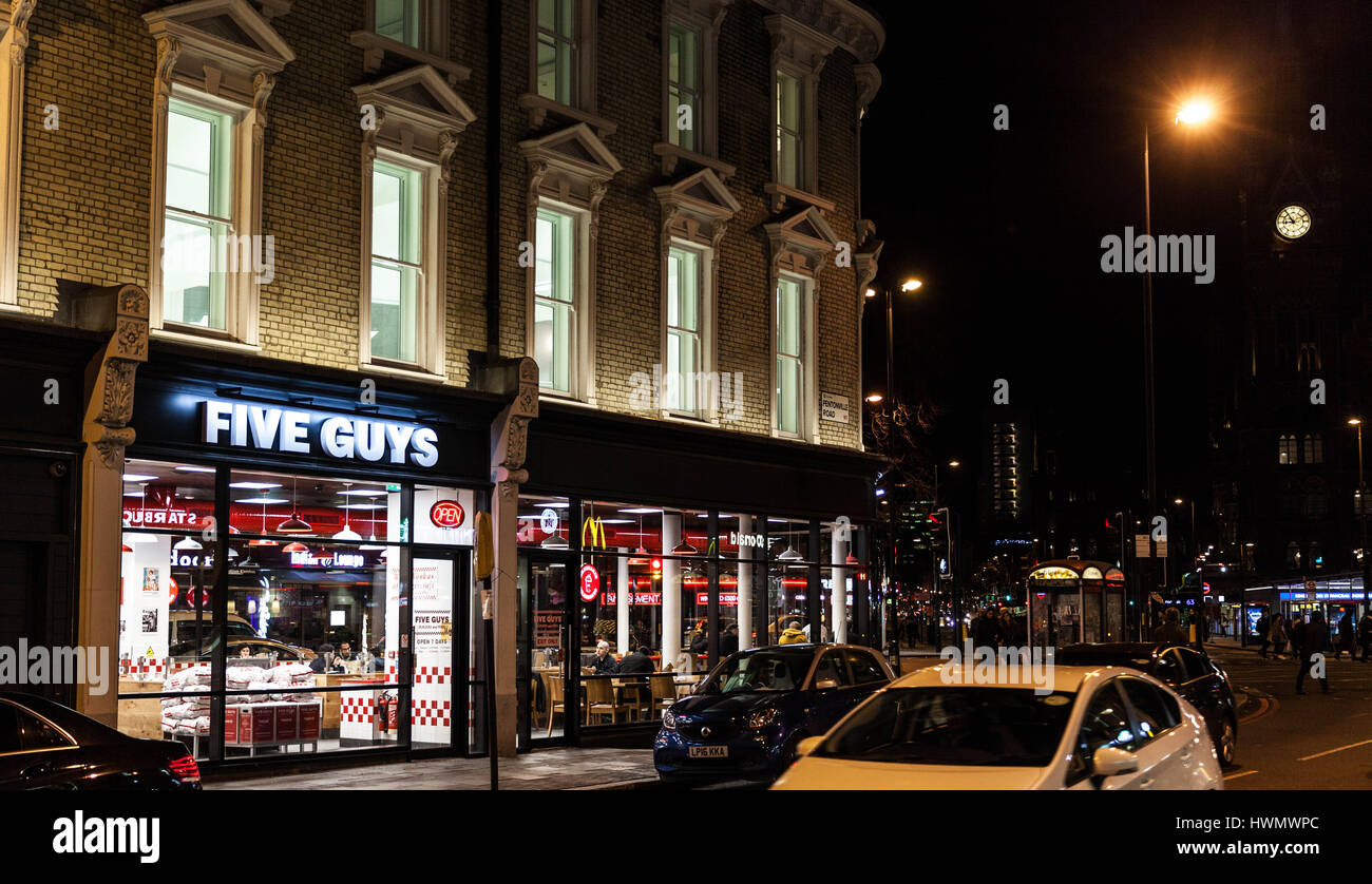 Five Guys restaurant at 295-297 The Kings Cross Lighthouse Block, Pentonville Road, Kings Cross, Central London, England, NC 1, UK. Stock Photo