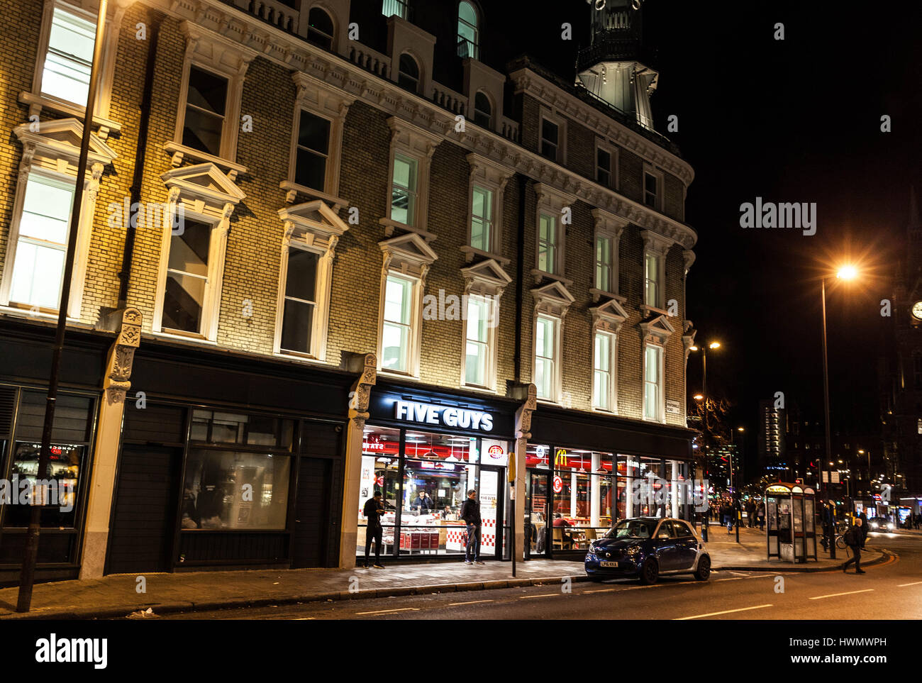 Five Guys restaurant at 295-297 The Kings Cross Lighthouse Block, Pentonville Road, Kings Cross, Central London, England, NC 1, UK. Stock Photo