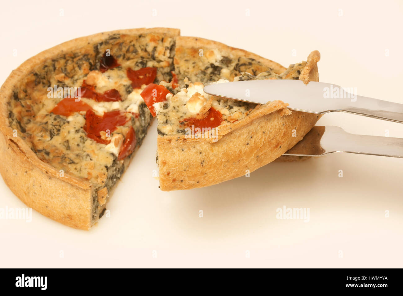 Serving a quiche Stock Photo